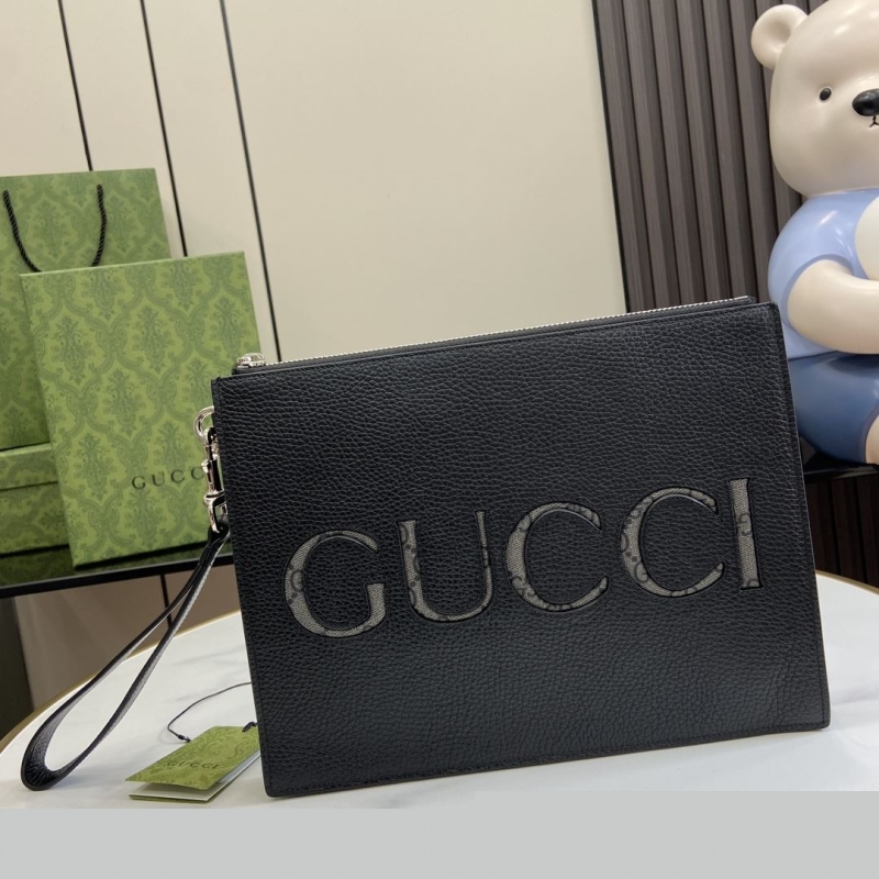 G*u*i clutch bags